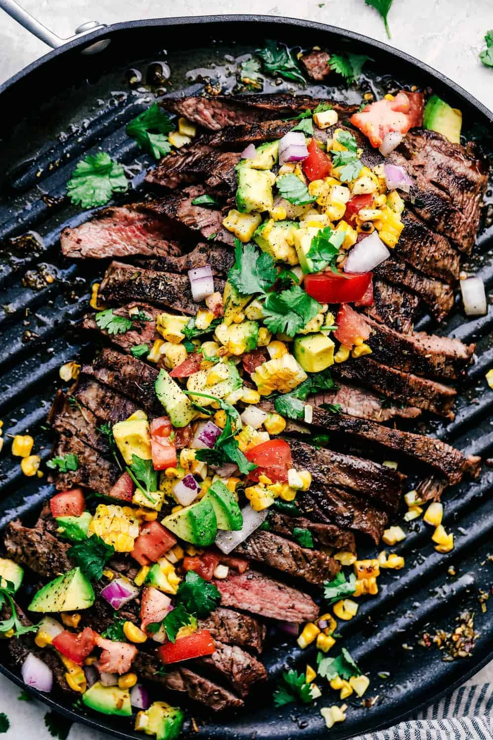 Grilled Garlic Herb Flank Steak with Avocado Corn Salsa