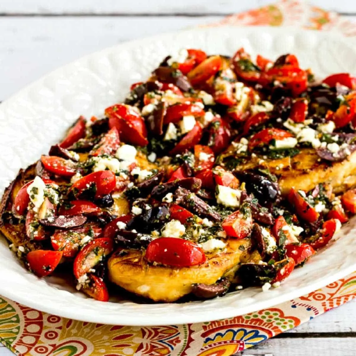 Greek Chicken with Tomato, Olive, and Feta Topping (Video)